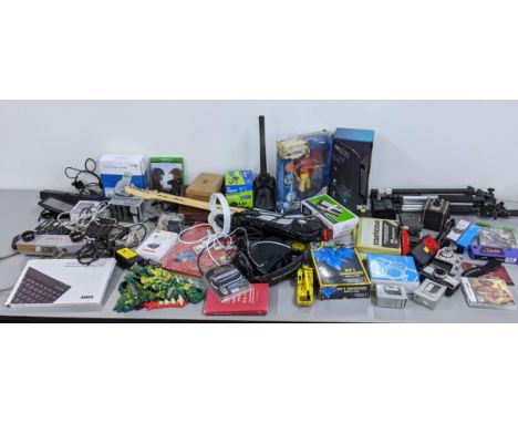 Photographic equipment and game related items to include a wii guitar, tripod, TomTom, a watch and other itemsLocation: 