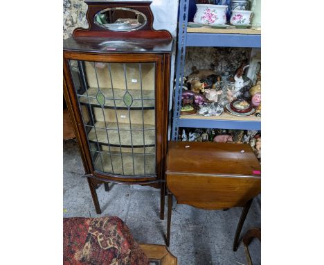 An Edwardian inlaid mahogany Pembroke table of small proportions, rectangular top with moulded edge, shaped D-end side flaps,