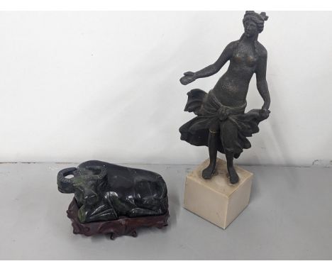A jade coloured model of an ox on base, together with a composition figure A/FLocation: 