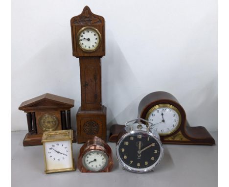 Mixed clocks to include an Edwardian mantel clock, one in the form of a longcase clock, JAZ Alarm clock and others Location: 