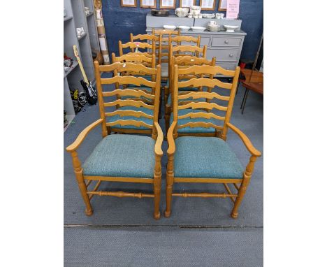 A set of reproduction oak ladder back dining chairs having turned supports and pad feetLocation: 