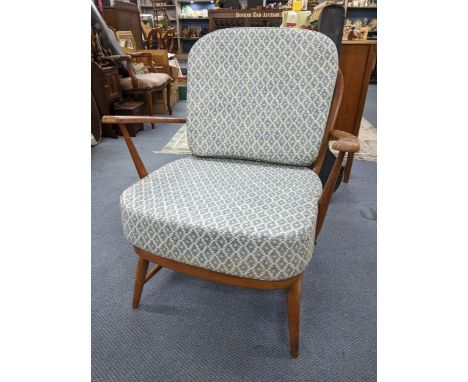 A mid 20th century Ercol model 203 beech spindle back armchairLocation: 