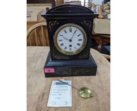 A Victorian 30 day mantel clock with white enamel Roman dial, moon hands, the movement stamped for Samuel Marti housed in a b