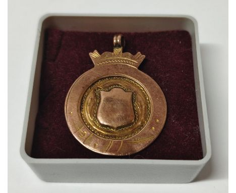 9ct. Rose Gold, 10 years fire service medal presented to R. Crossly 3.8 grams