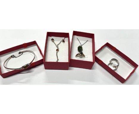 Silver green stone pendant on a chain with earings along with silver and amber necklace with bangle (2) 