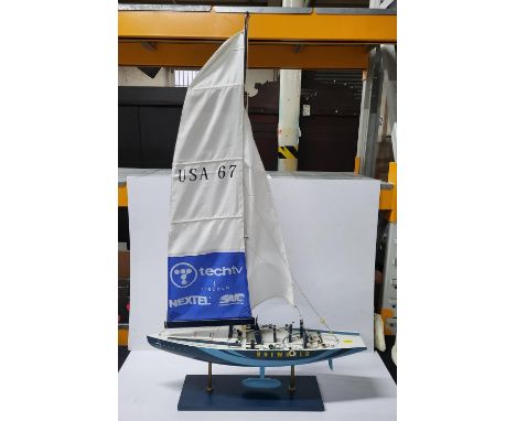 Large "USA 67 ONE WORLD" model racing yacht on stand, measuring 100cm high 