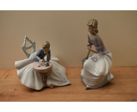 Two large Nao by Lladro porcelain figurines comprising 'Spring Reflections' number 1392 measuring 30cm and 'Playing with Kitt