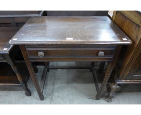 An Ercol Golden Dawn elm single drawer side table 