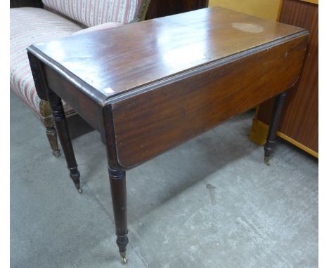 A Victorian mahogany Pembroke table 