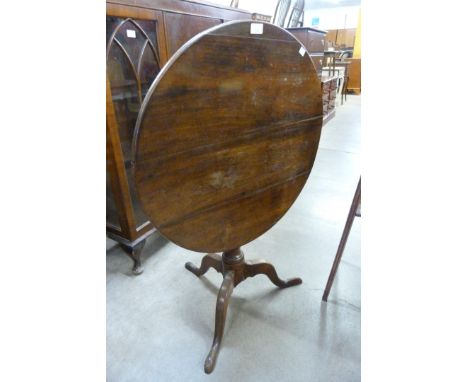 A George III oak circular tilt-top tripod tea table 