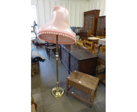 A brass standard lamp and an oak sewing box 