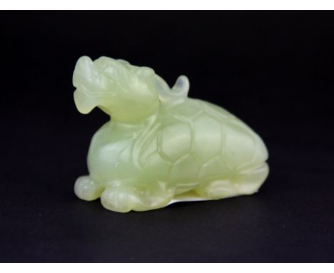 A Chinese carved jade figure of a qilin, 4.5 x 7cm.