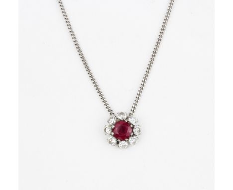 An 18ct white gold (stamped 750) necklace set with a ruby surrounded by brilliant cut diamonds, diamonds approx. 0.80ct, ruby