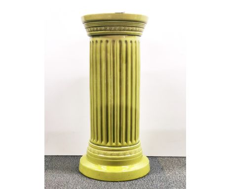 A ceramic column plant stand, H. 64cm.