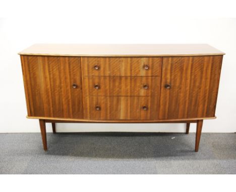 A 1960's light mahogany sideboard with Frederick Restall label, W. 152cm. H. 86cm.