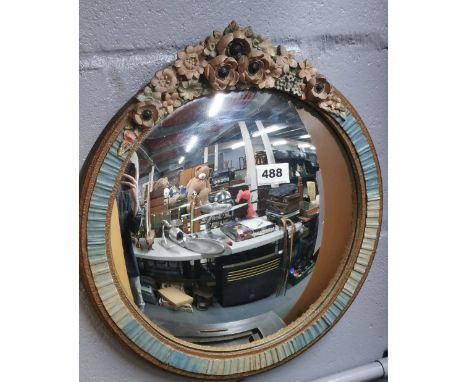 A 1920's Barbola convex wall mirror.