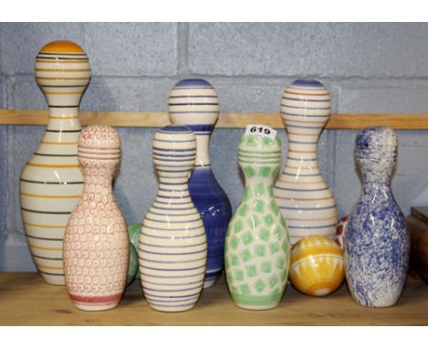 A group of ceramic carpet bowls.