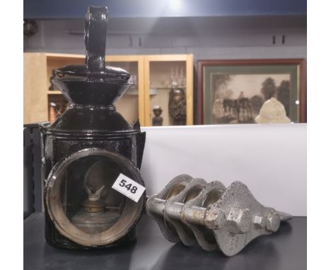 An antique railway oil signalling lamp and an early metal North Eastern Railway pulley.