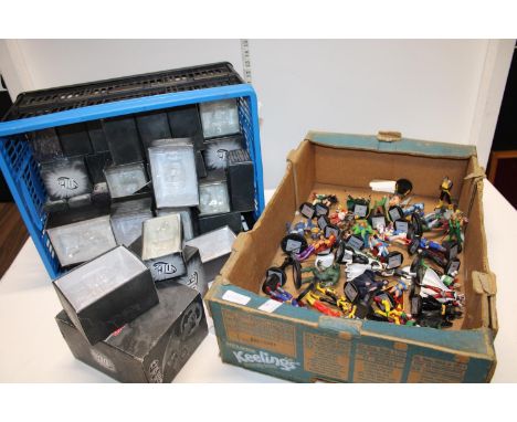 A good job lot of DC comic die-cast figures and a selection of model boxes 