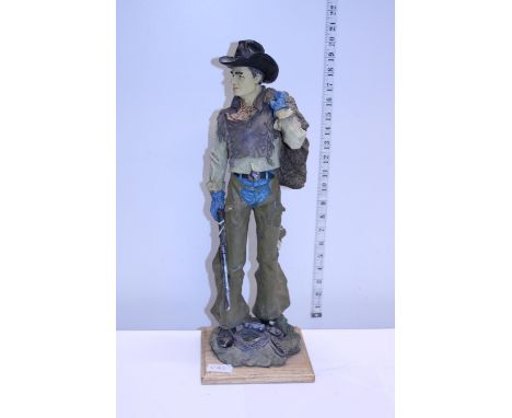 A large model of a cowboy 