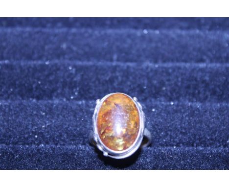 A vintage 925 silver and amber ring 