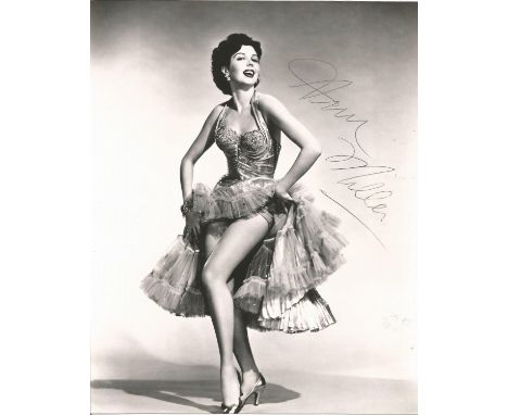 Actress Ann Miller signed 10x8 vintage black and white photo. Ann Miller was an American actress, dancer and singer. She is b