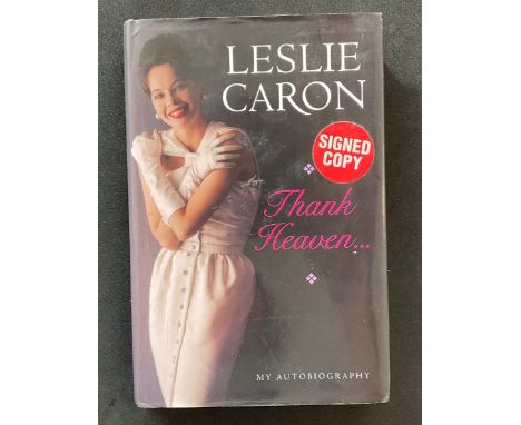 Actress Leslie Carons autobiography Thank Heaven.. with signed card from The Fordingbridge Bookshop inscribed Happy Christmas