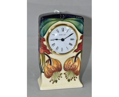 NICOLA SLANEY FOR MOORCROFT, a mantel clock decorated in the 'Anna Lily' pattern, height 15cm (5) (Condition report: crazing 