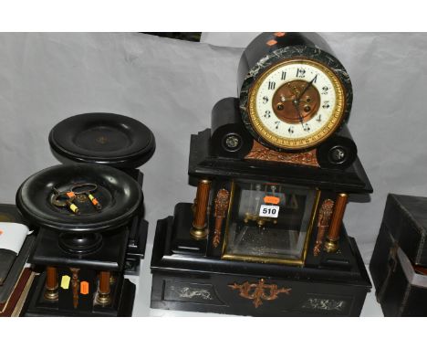 A LATE 19TH CENTURY BLACK SLATE AND GREEN MARBLE INSET CLOCK GARNITURE, the drum shaped clock with enamel chapter ring, Arabi