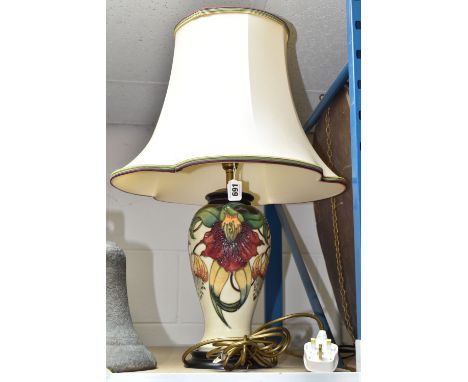 A MOORCROFT TABLE LAMP, Anna Lily pattern on a cream ground, original shade, height 36cm to top of brass fitting (1) (Conditi