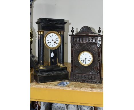 TWO MANTEL CLOCKS, comprising a French portico clock in need of restoration and a carved wooden mantel clock, pendulum bar an