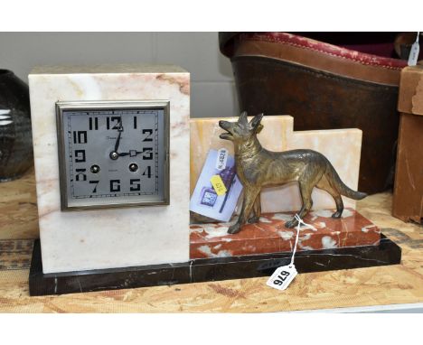 A FRENCH ART DECO MANTEL CLOCK, the geometric three coloured marble case surmounted by a cast metal figure of an Alsatian dog