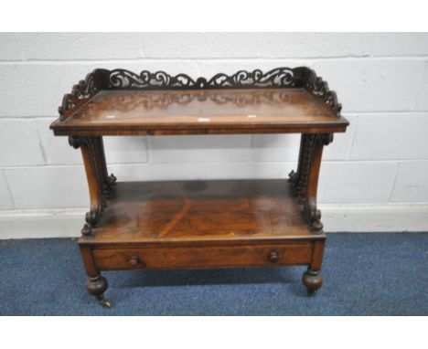 A VICTORIAN ROSEWOOD BUFFET, the top shelf with an open fretwork gallery, supported on bobbin turned and scrolled uprights, a