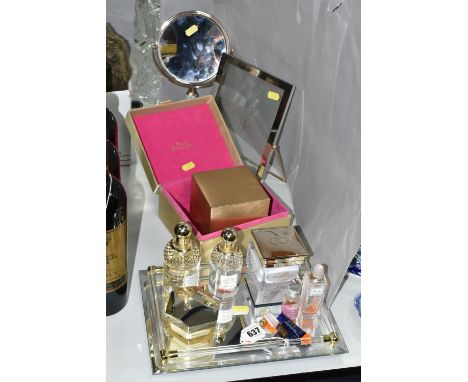 A 125ML BOTTLE OF GUERLAIN EAU DE TOILETTE 'MANDARINE BASILIC', together with a rose gold  magnified vanity mirror, Jasper Co