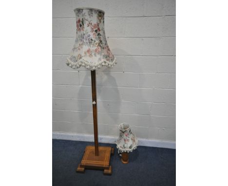 A BESPOKE OAK STANDARD LAMP, of a square form, height 161cm, with a floral fabric shade, along with a table lamp (condition r