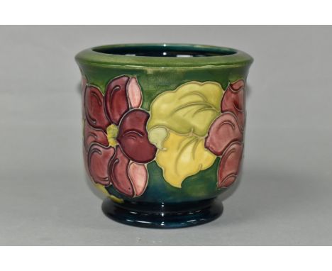 A MOORCROFT POTTERY PLANTER, tube lined with a pink Clematis pattern on a graduated green to turquoise ground, painted and im