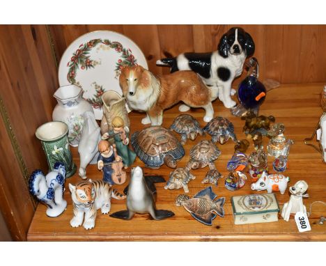 A GROUP OF CERAMIC AND GLASS ORNAMENTS, to include a Lomonosov figure of a sealion, other Russian ceramic figures of a tiger 