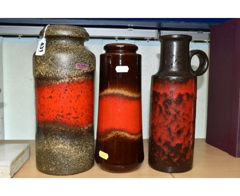 THREE WEST GERMAN SCHEURICH VASES, comprising a 517-30 vase, with smooth red glazed band on a textured brown ground, height 3