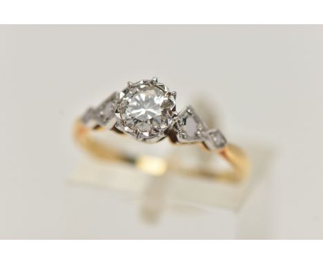 A YELLOW AND WHITE METAL SINGLE STONE DIAMOND RING, round brilliant cut diamond, illusion set, estimated diamond weight 0.40c