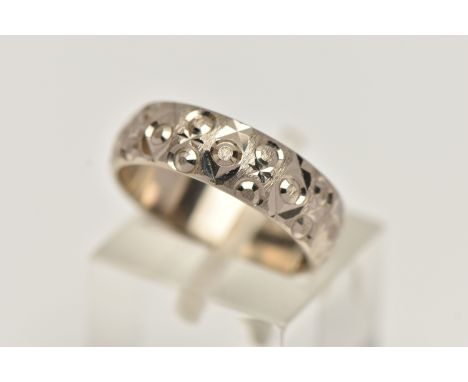 AN 18CT WHITE GOLD BAND RING, wide textured band, approximate band width 5.6mm, hallmarked 18ct Birmingham, ring size leading