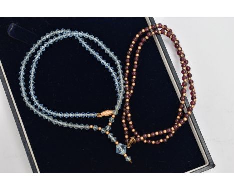 TWO GEM SET NECKLACES, the first desinged as a row of polished circular garnet beads, with yellow metal ball spacers, fitted 