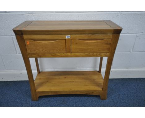 A LIGHT OAK SIDE TABLE, with two drawers, and undershelf, width 85cm x depth 35cm x height 78cm (condition report: -good)