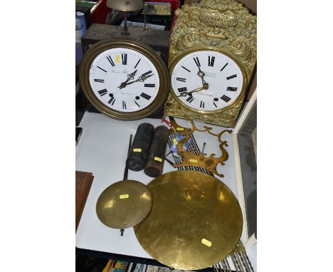 TWO LATE 19TH / EARLY 20TH CENTURY FRENCH COMPTOISE WALL CLOCKS, both with white enamel dials with Roman numerals, striking o