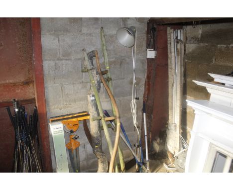 A small quantity of garden tools together with work light