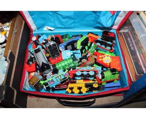 A quantity of various model trains to include Thomas the Tank Engine 