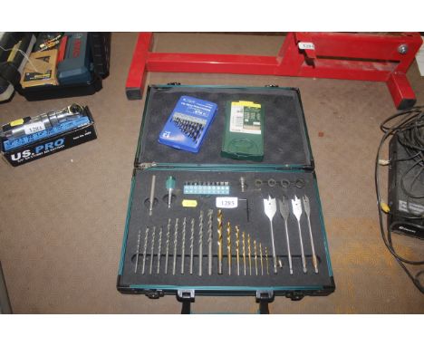 A quantity of Makita drill bits in fitted case