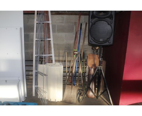 A quantity of long handled tools to include shovels, pick etc.