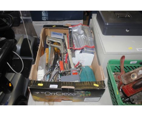A box containing a quantity of tools to include a 25 piece alan key set , spanners, saws, etc. 