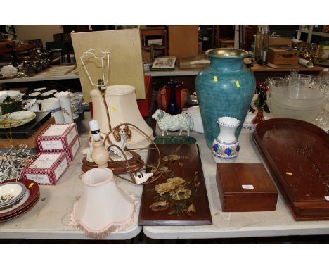 A large pottery vase; a Florence table lamp and shade; a cast iron doorstop; a painted decorative panel etc.