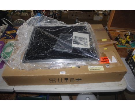 An AEG 590 electric induction hob, with original packaging and user manual